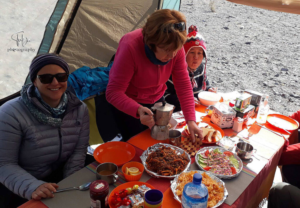 Clients in dining tent Nomadic Trails