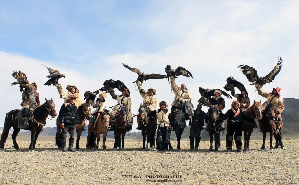 Majestic group of Eagle Hunters at eagle festival Mongolia