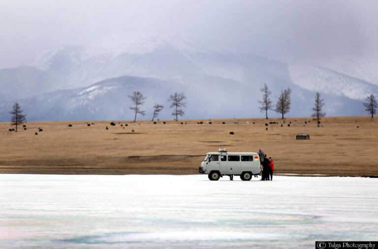 Mini van on ice during Nomadic Trails winter tour