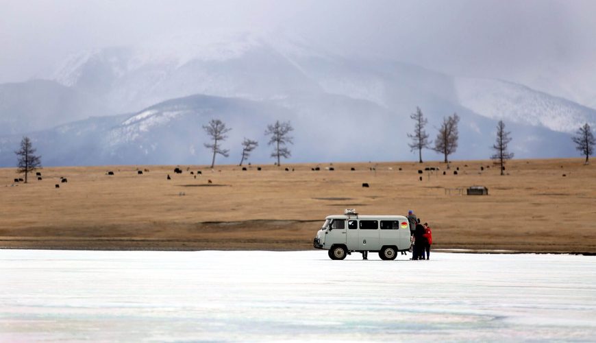 Mini van on ice during Nomadic Trails winter tour