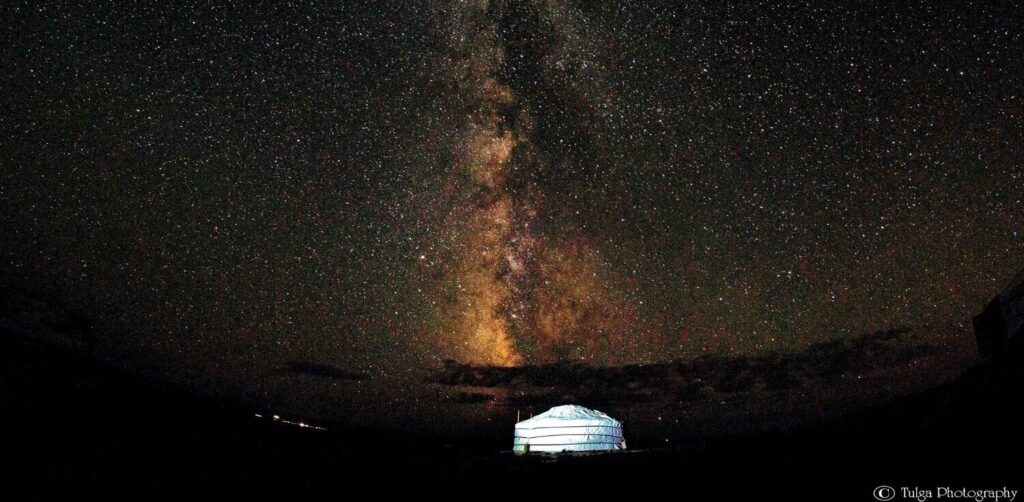 Tours Mongolia - traditional mongolian yurt under starry night sky