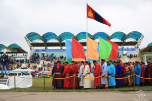 Tournament participants at flag Naadam Festival