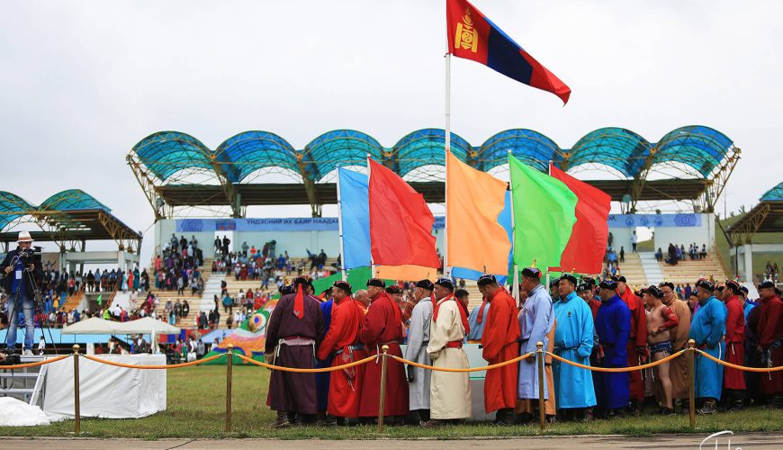 Tournament participants at flag Naadam Festival