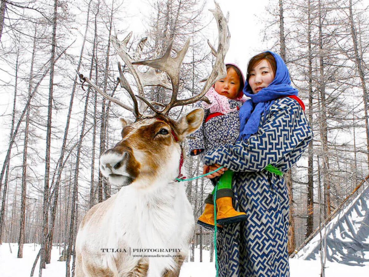 reindeer herder woman with her daughter